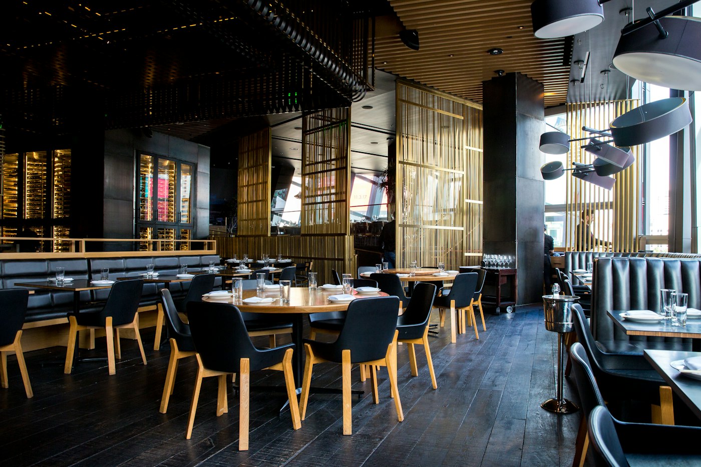 A dining room with tables set for service.